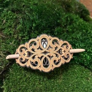 Intricate hair bun holder